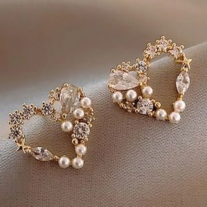 Imitation pearl heart earrings
